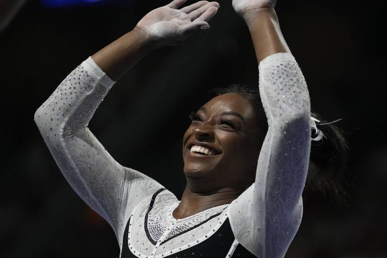 Simone Biles easily wins in return to competitive gymnastics